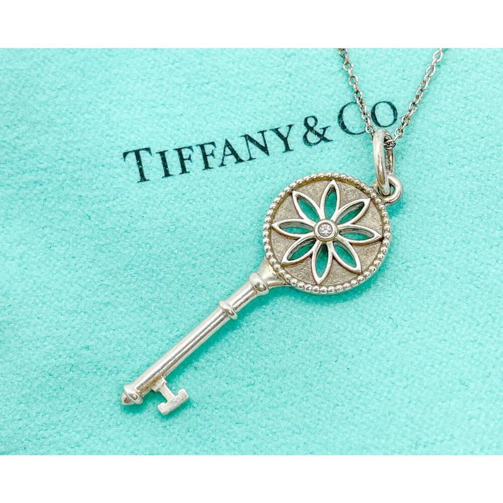 Tiffany & Co. Diamond Daisy Flower Key Pendant Necklace Sterling Silver 16"